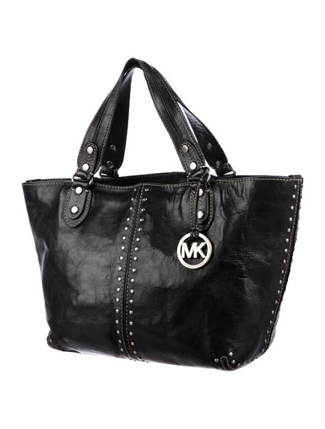 black shiny mk purse - michael kors black studded bag.